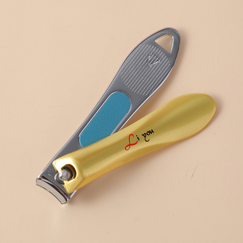 Oval gold nail clippers