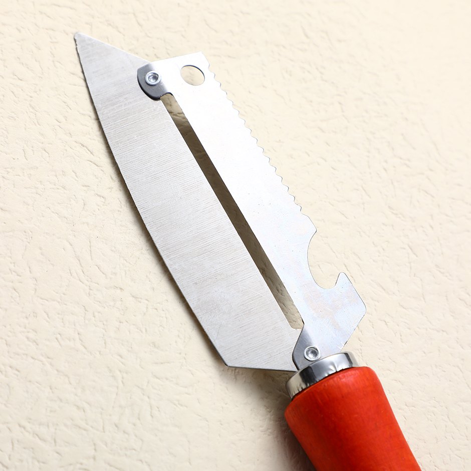 Four purpose wooden handle peeler