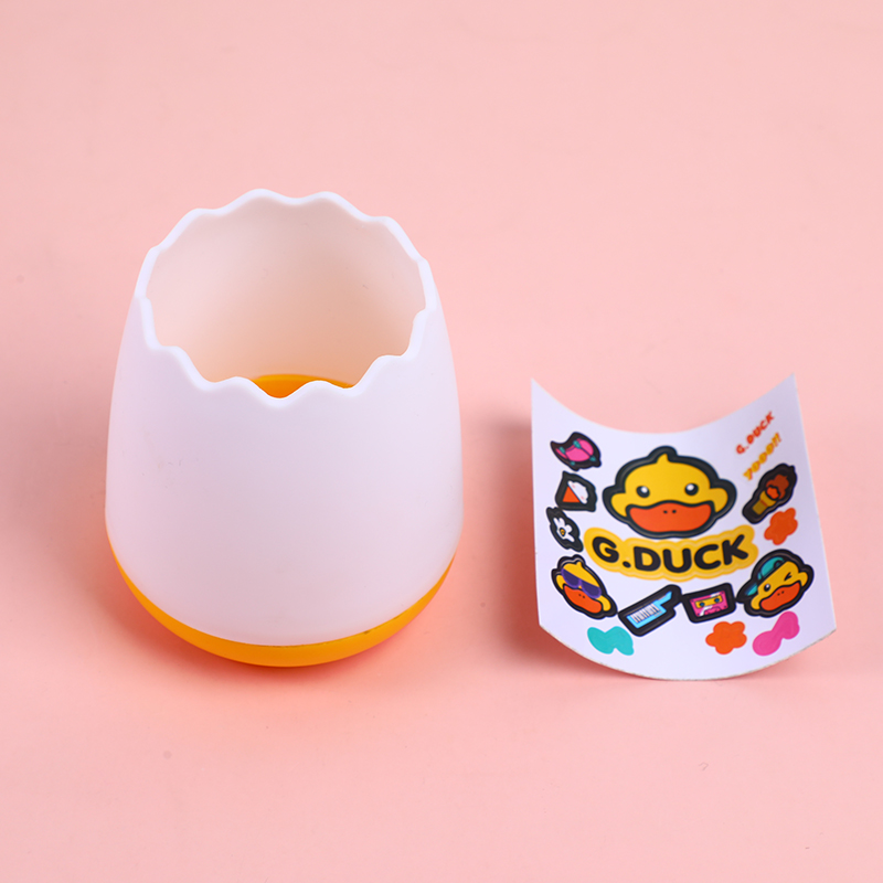Little yellow duck egg-shaped pen holder