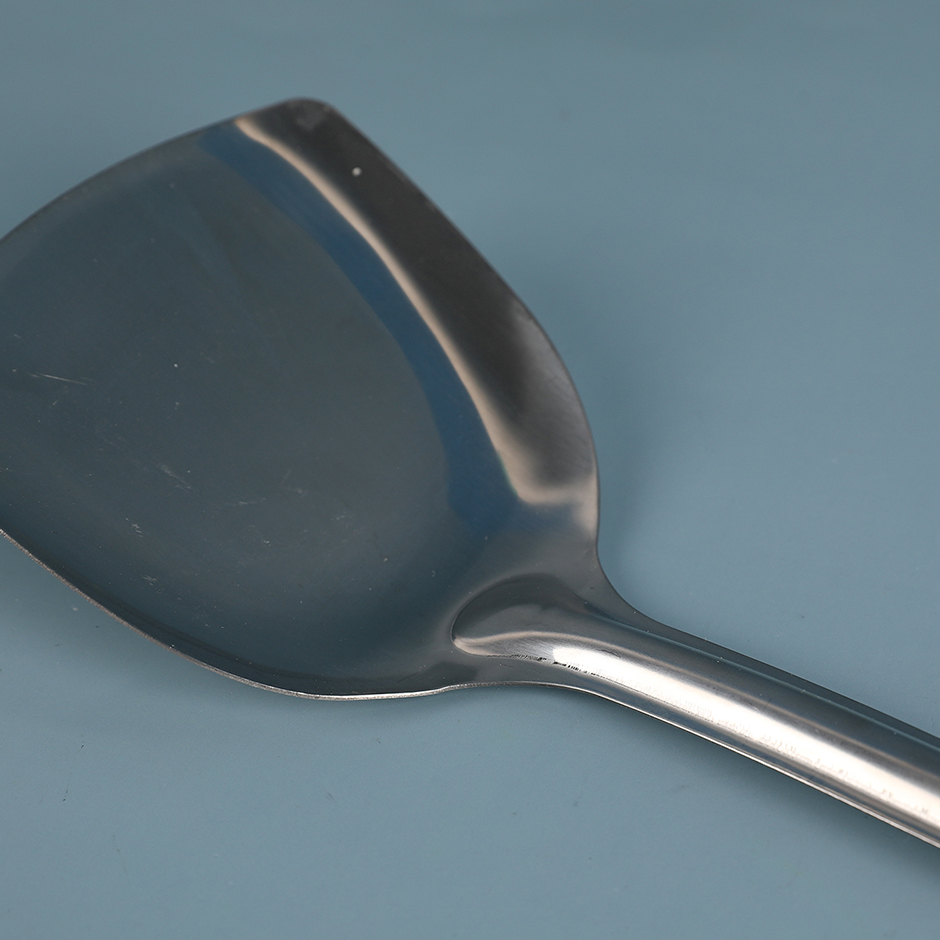 Golden three holes cooking shovel