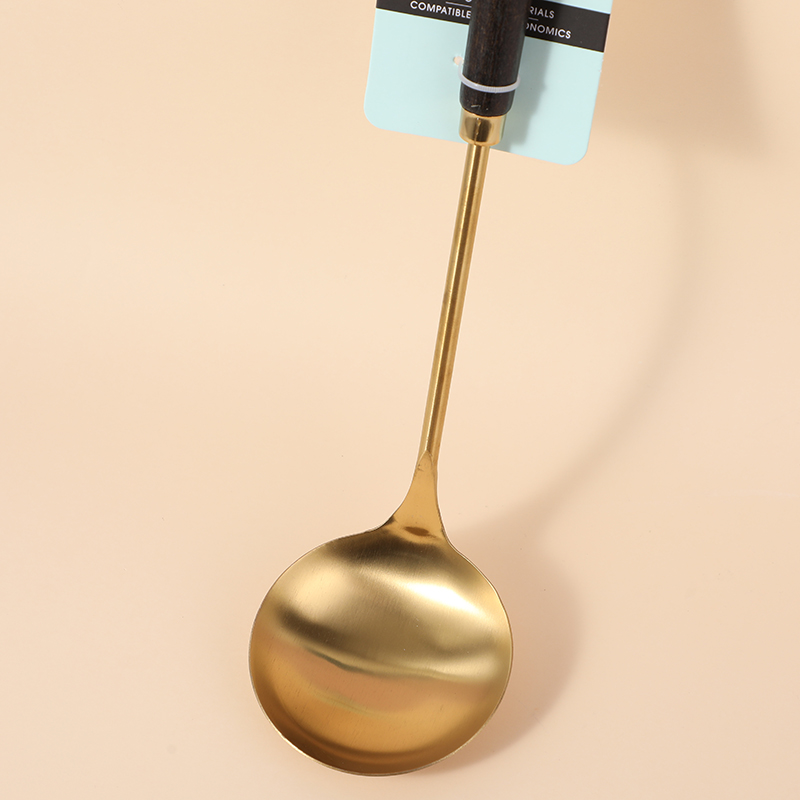 Gold-plated ladle with wood handle