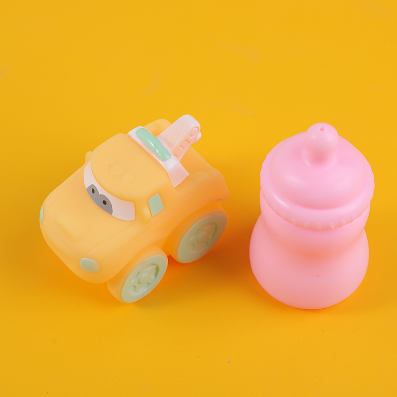 Soft plastic feeding bottle and car bath toy